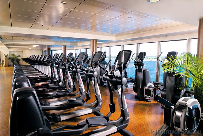 Pēc brīnumgardajām kuģa maltītēm pasažieriem tiek piedāvāta iespēja izmantot kuģa fitnesa centru 
Foto: Ncl.com 51394